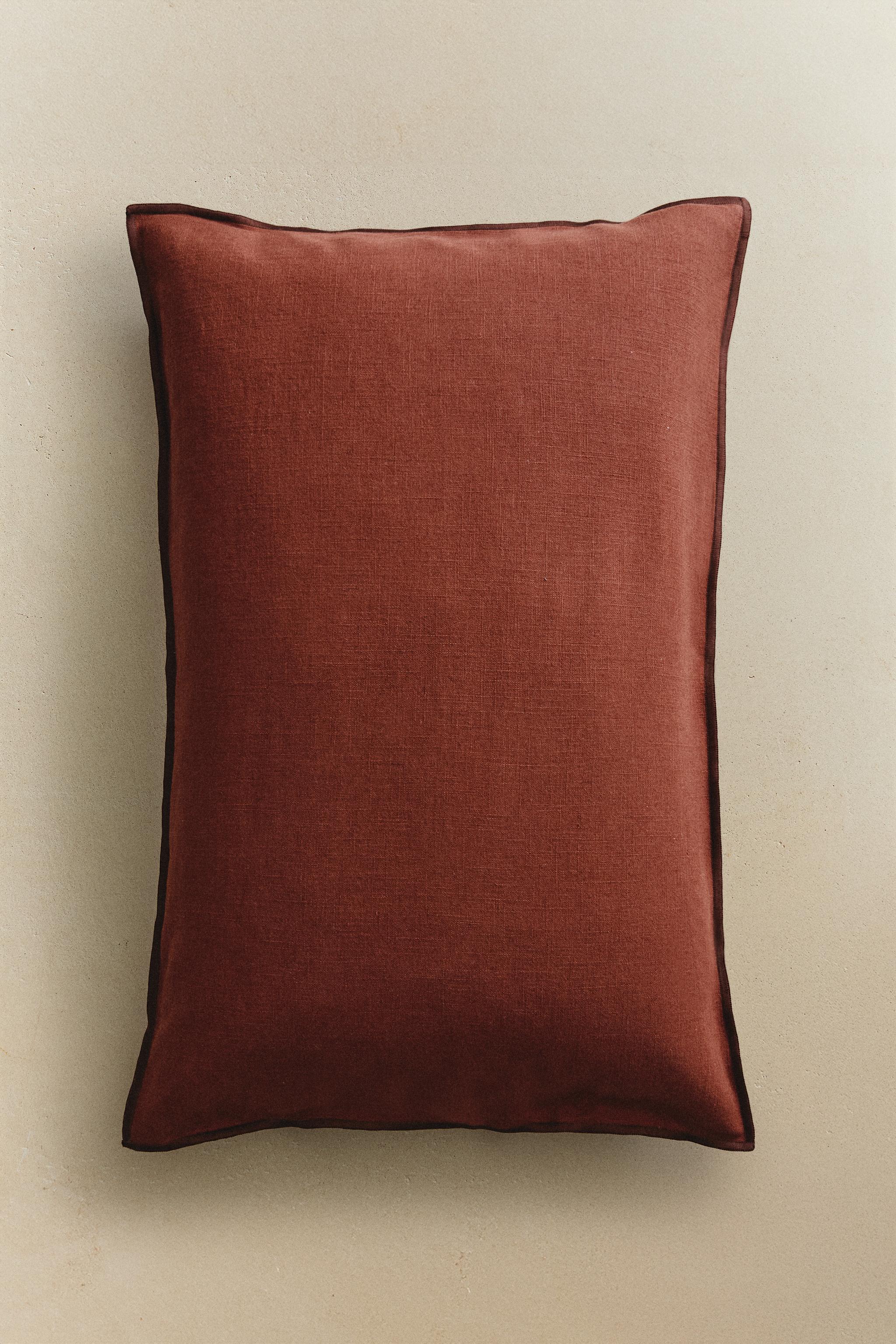 HOUSSE DE COUSSIN OVERLOCK